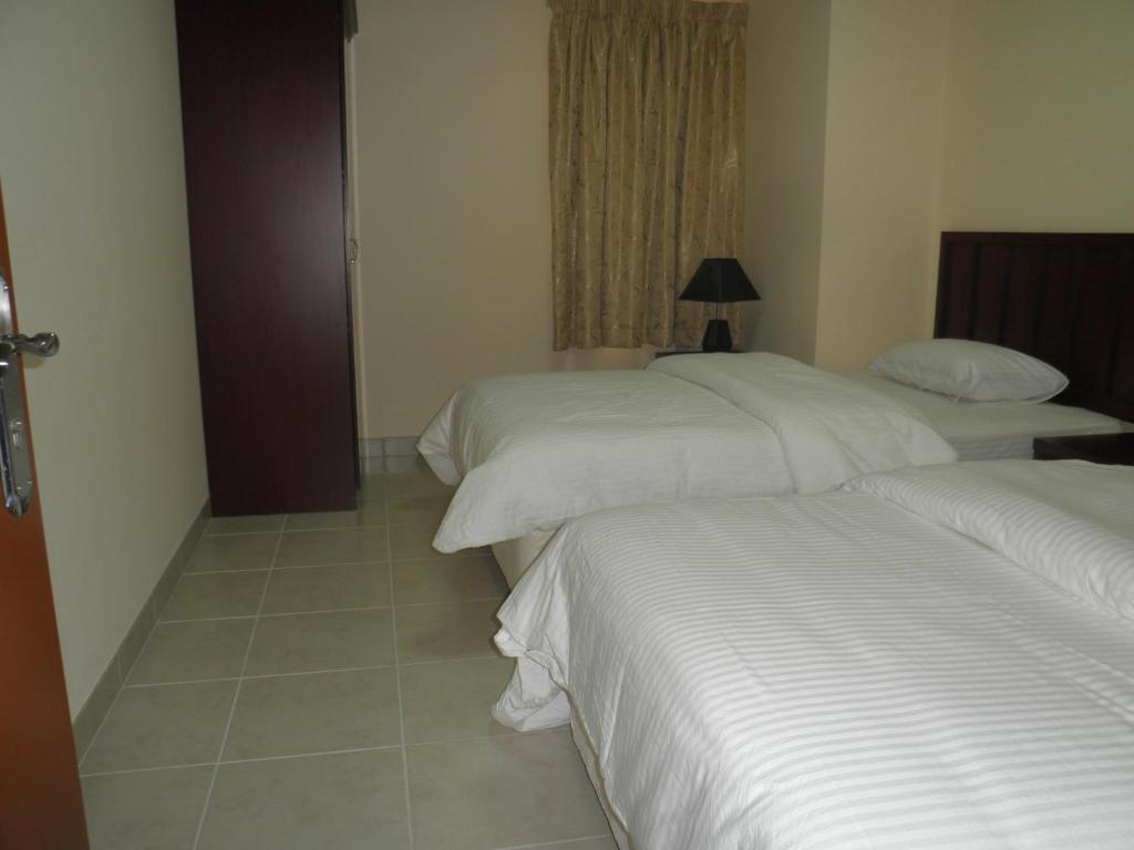 Hamasa Plaza Hotel Al Buraimi Quarto foto
